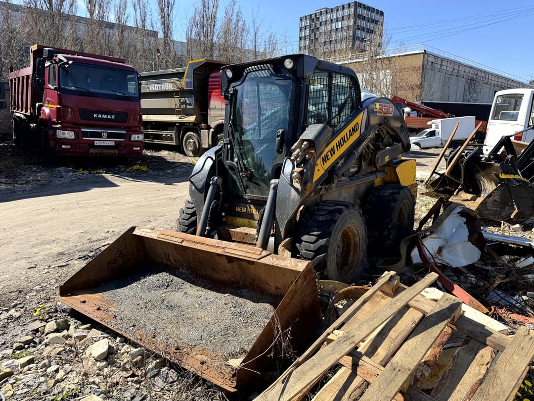 New Holland L330 Мини погрузчик - 1