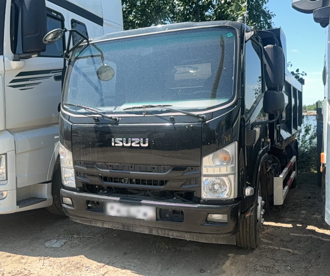 ISUZU ELF 10.5 4x2 Самосвал - 1