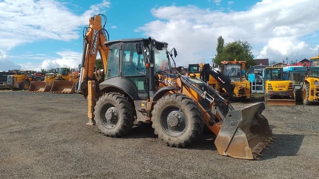 Case 695* Экскаватор-погрузчик - 2