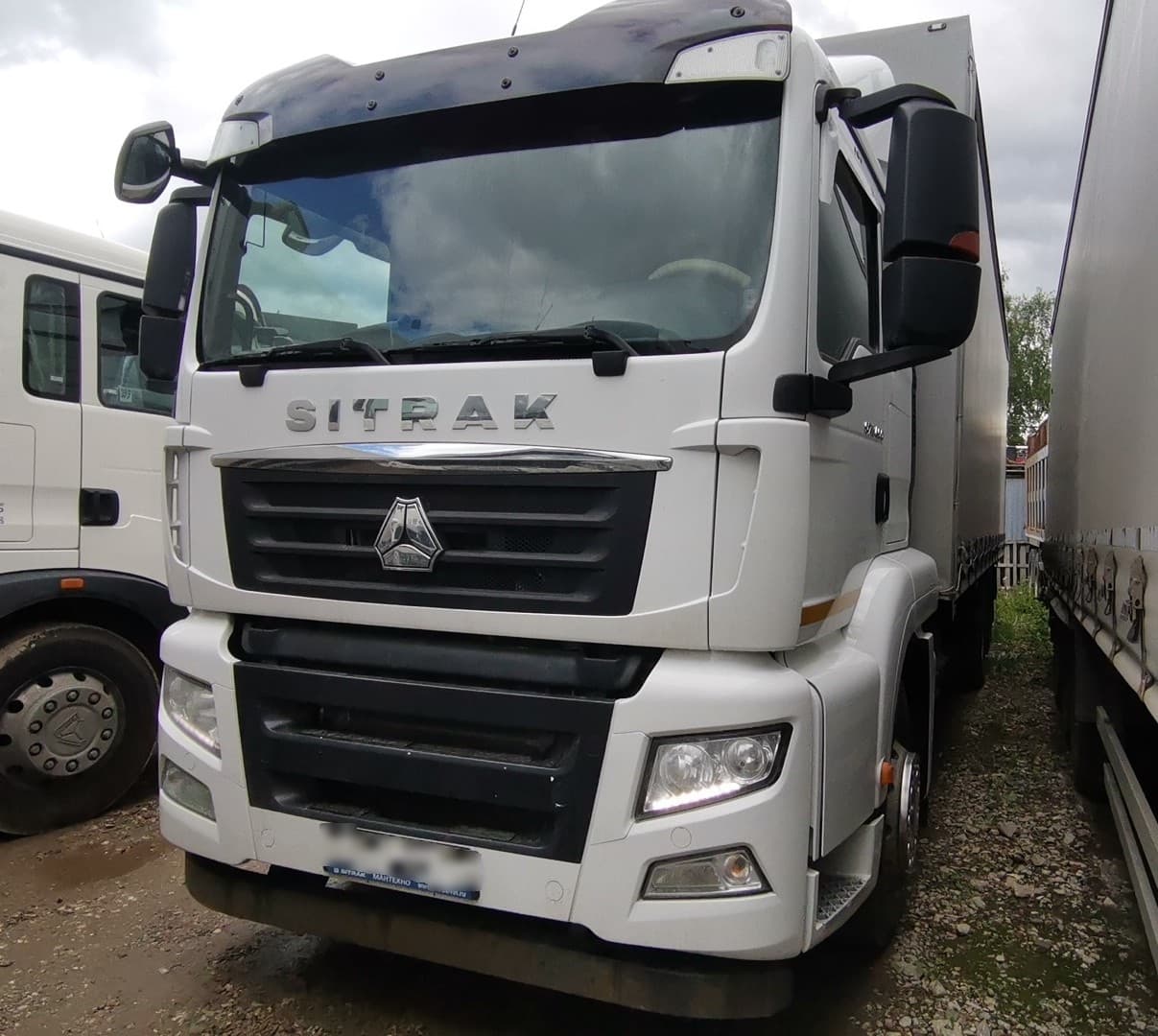 Ттм-Центр АБ* на шасси SITRAK C7H 6x2 Бортовой (Евроборт) - 1