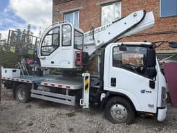 ISUZU ELF 6.0 4x2 Автовышка - 1