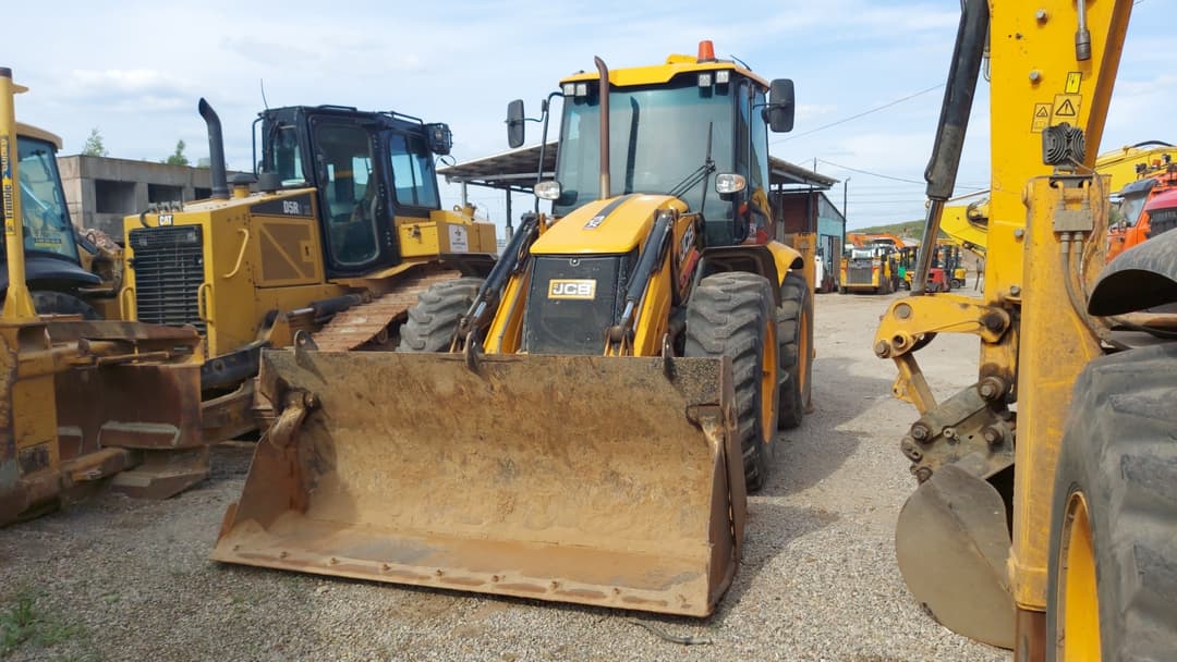 JCB 4CX Экскаватор-погрузчик - 1