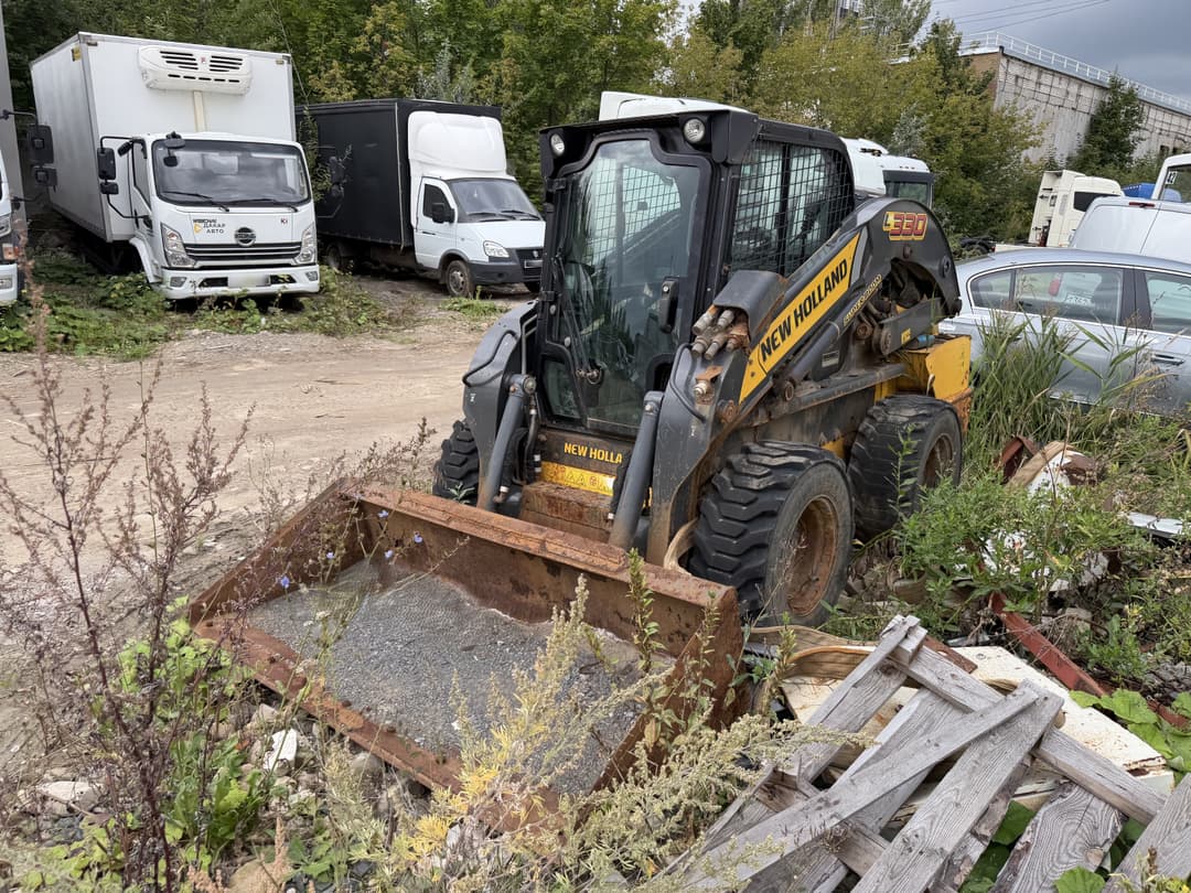 New Holland L330 Мини погрузчик - 1