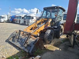 Case 570 ST Экскаватор-погрузчик - 1
