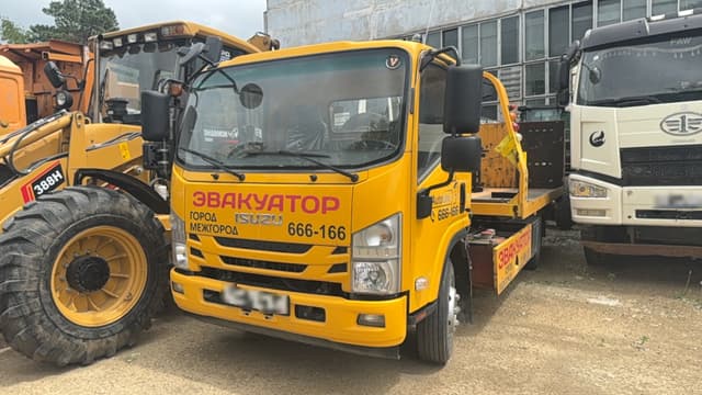 ISUZU ELF 10.5 4x2 Эвакуатор - 1