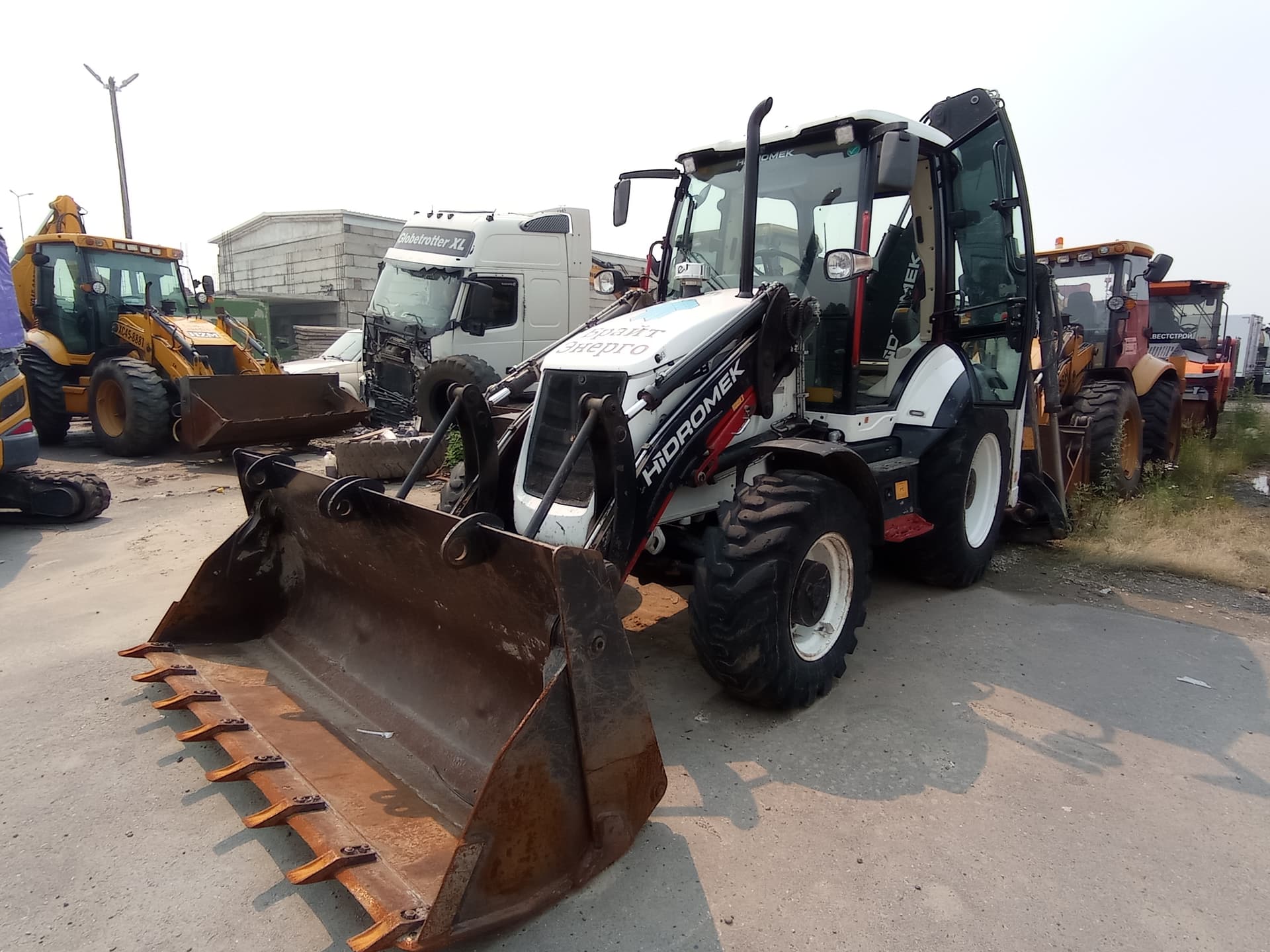 Hidromek HMK* Экскаватор-погрузчик - 1