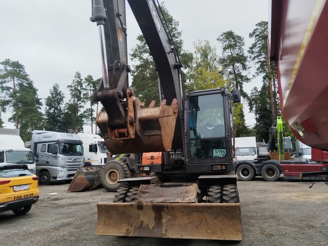 Daxin DX180* Экскаватор колесный - 1