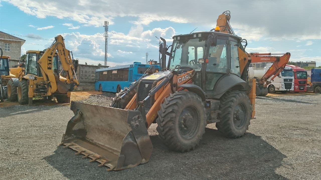 Case 695* Экскаватор-погрузчик - 1