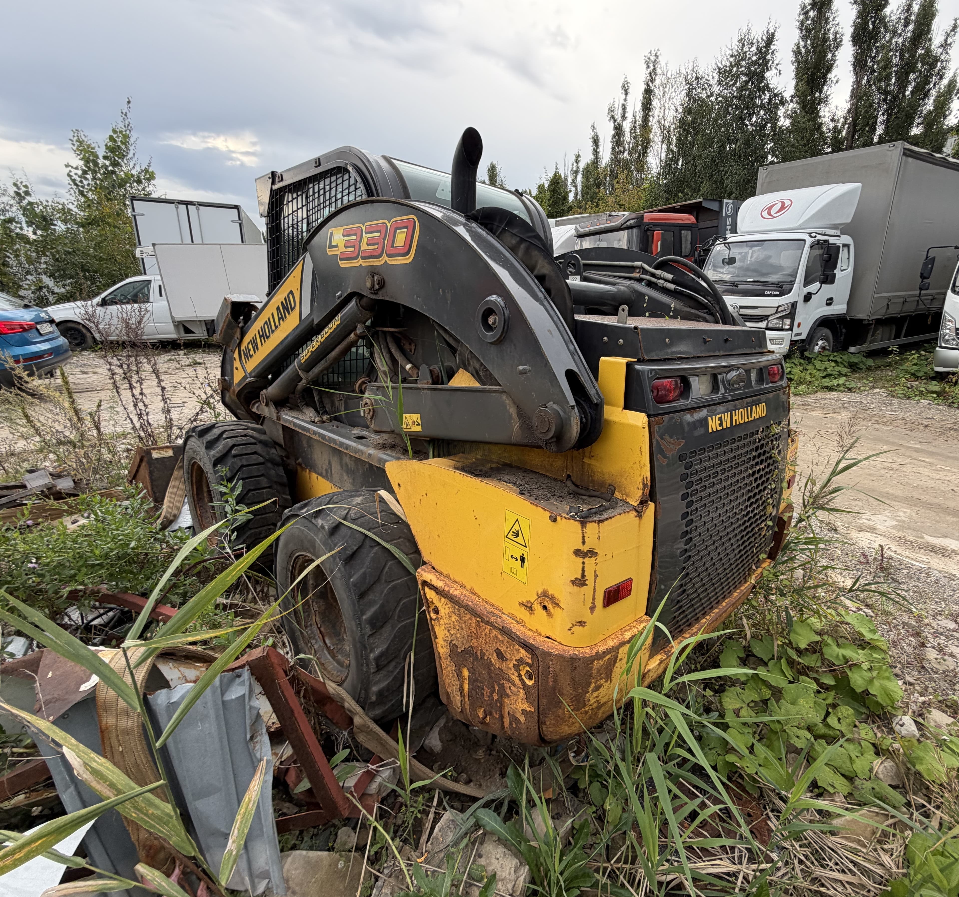 New Holland L330 Мини погрузчик - 4
