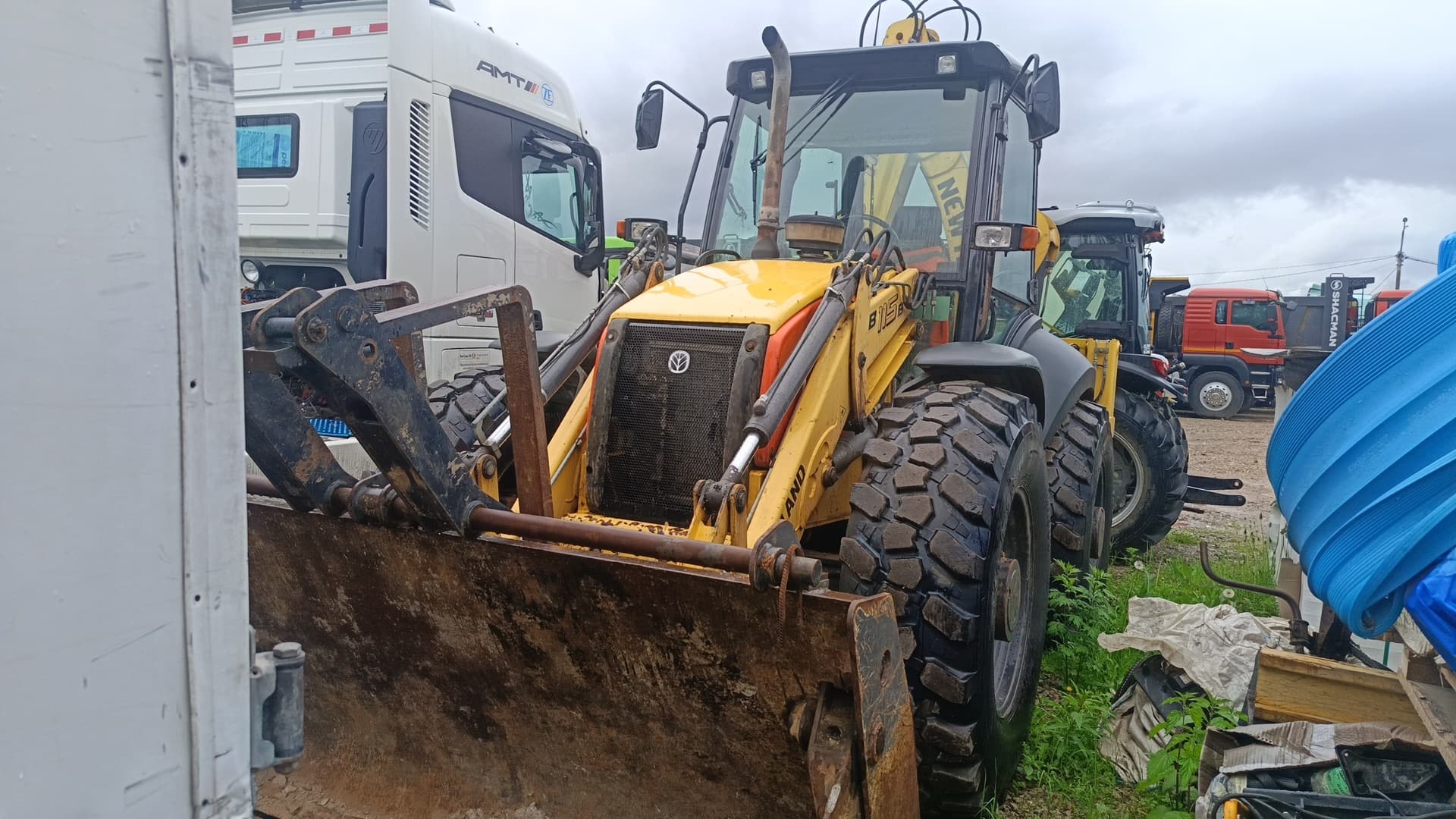 New Holland B115B Экскаватор-погрузчик - 1