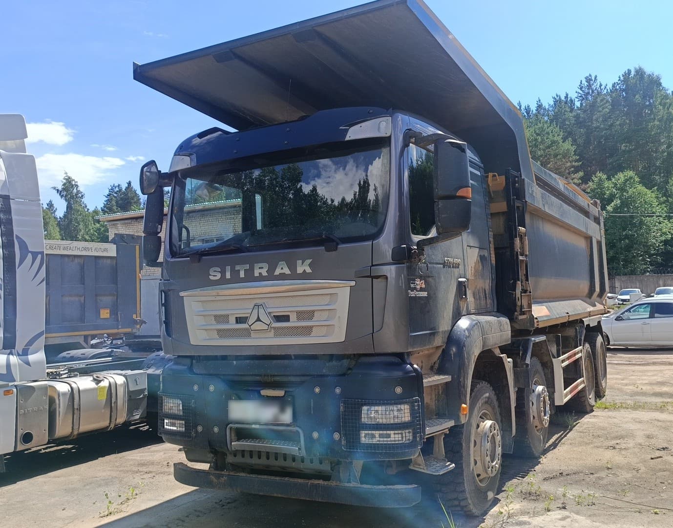 Sitrak C7H 8x4 Самосвал - 1