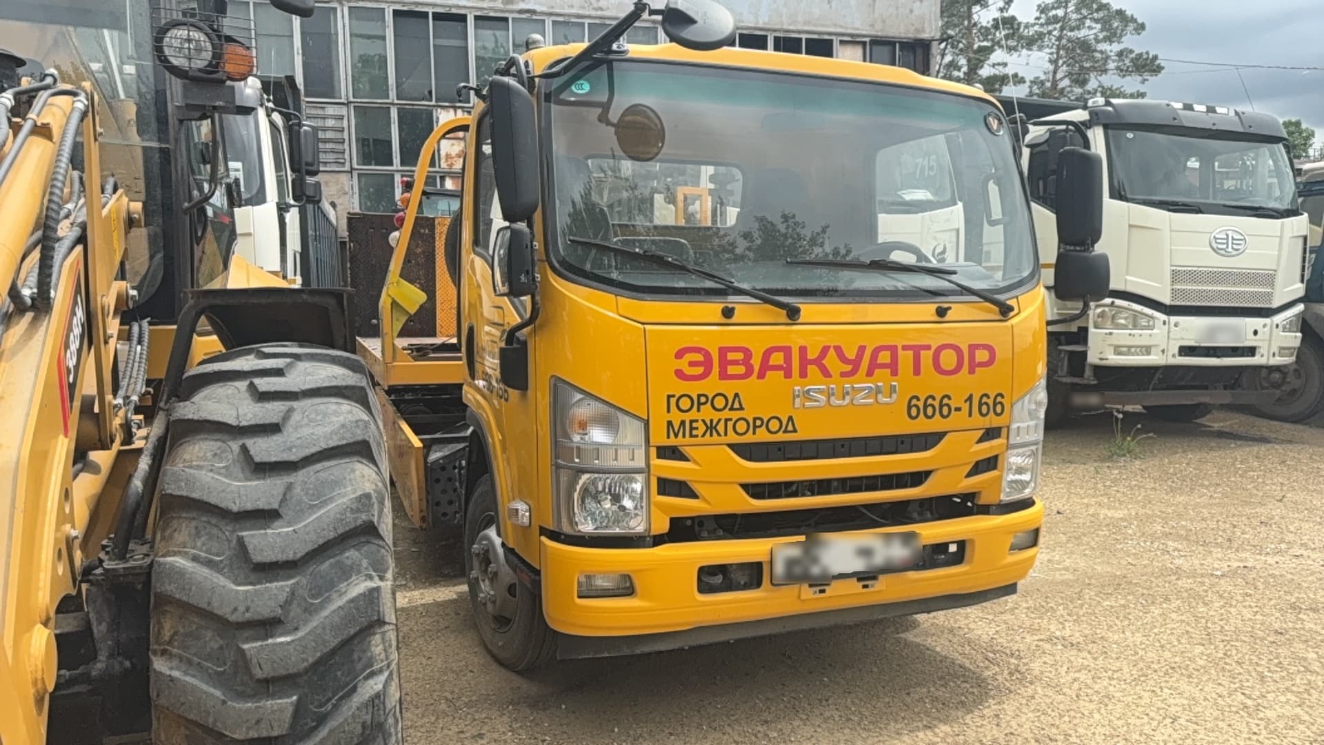ISUZU ELF 10.5 4x2 Эвакуатор - 2