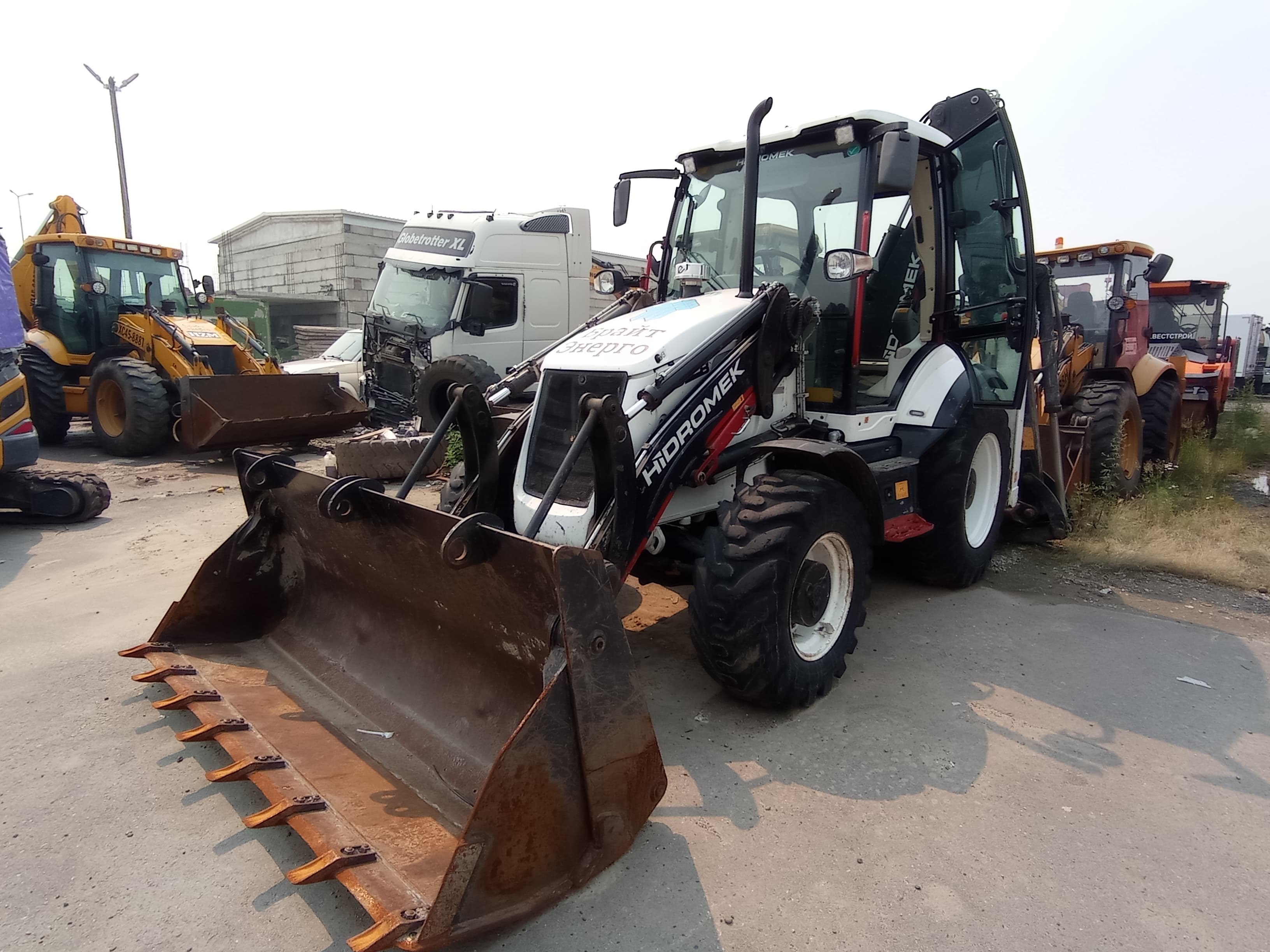 Hidromek HMK* Экскаватор-погрузчик - 1